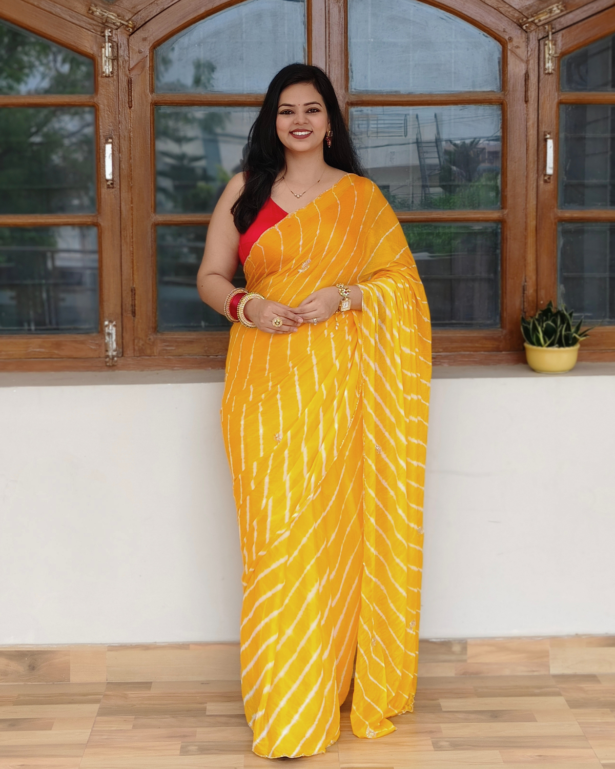 Yellow Embroidered Leheriya Chinon Saree