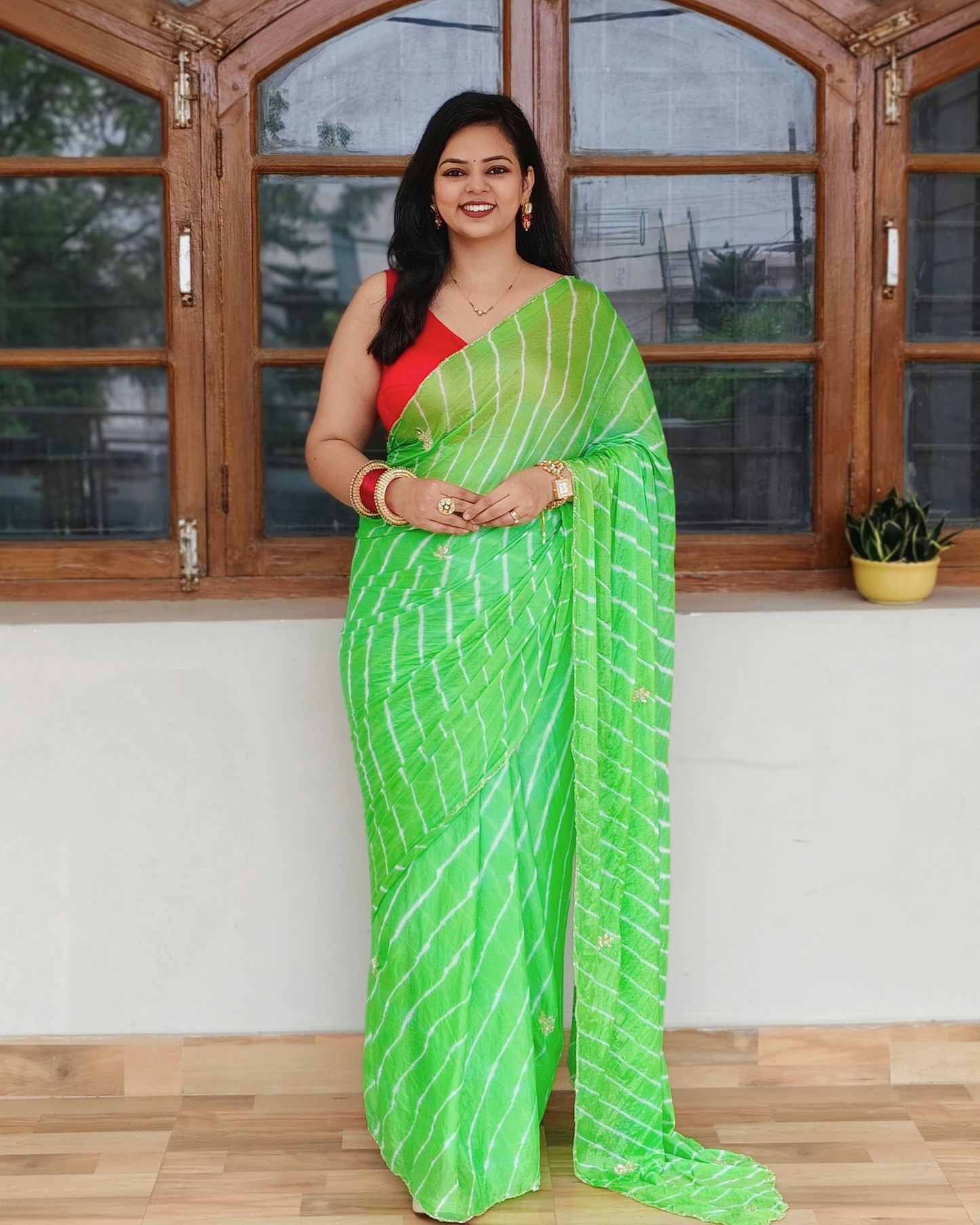 Parrot Green Embroidered Leheriya Chinon Saree