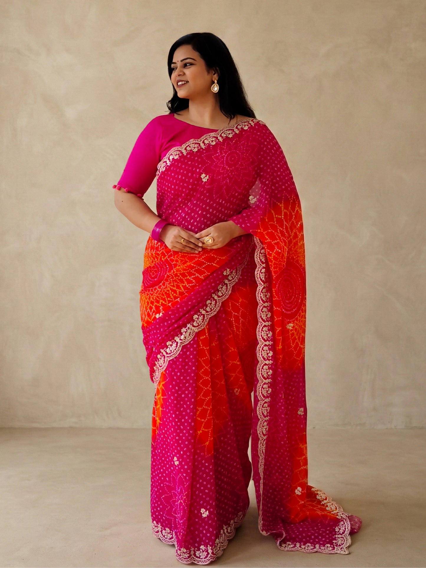Pink And Orange Bandhani Printed Georgette Saree