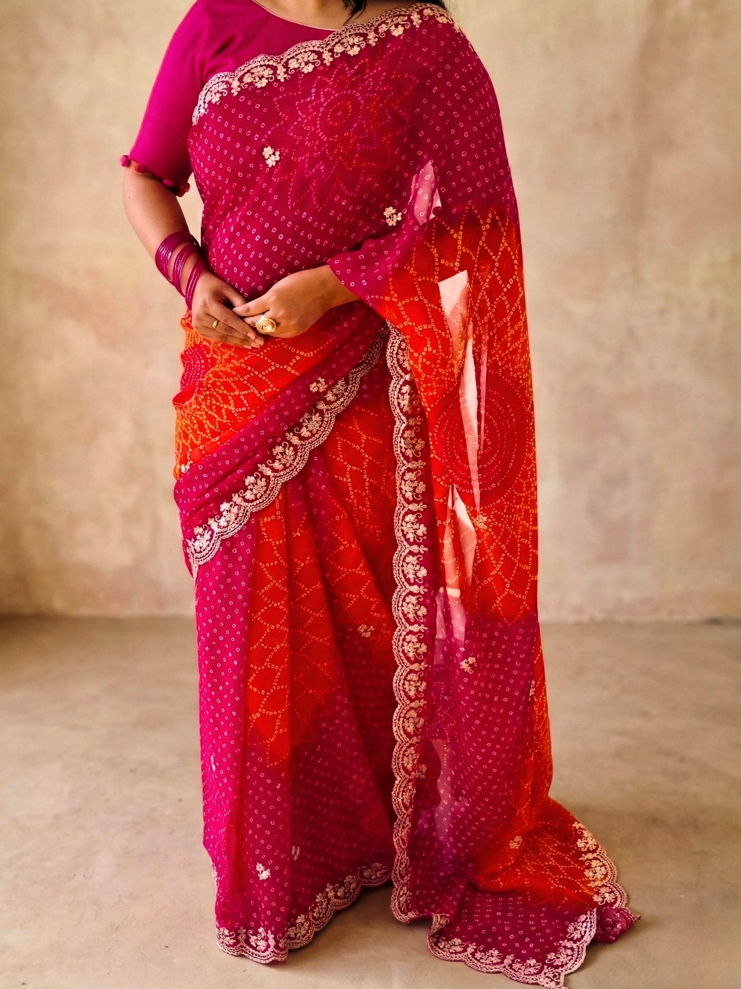 Pink And Orange Bandhani Printed Georgette Saree