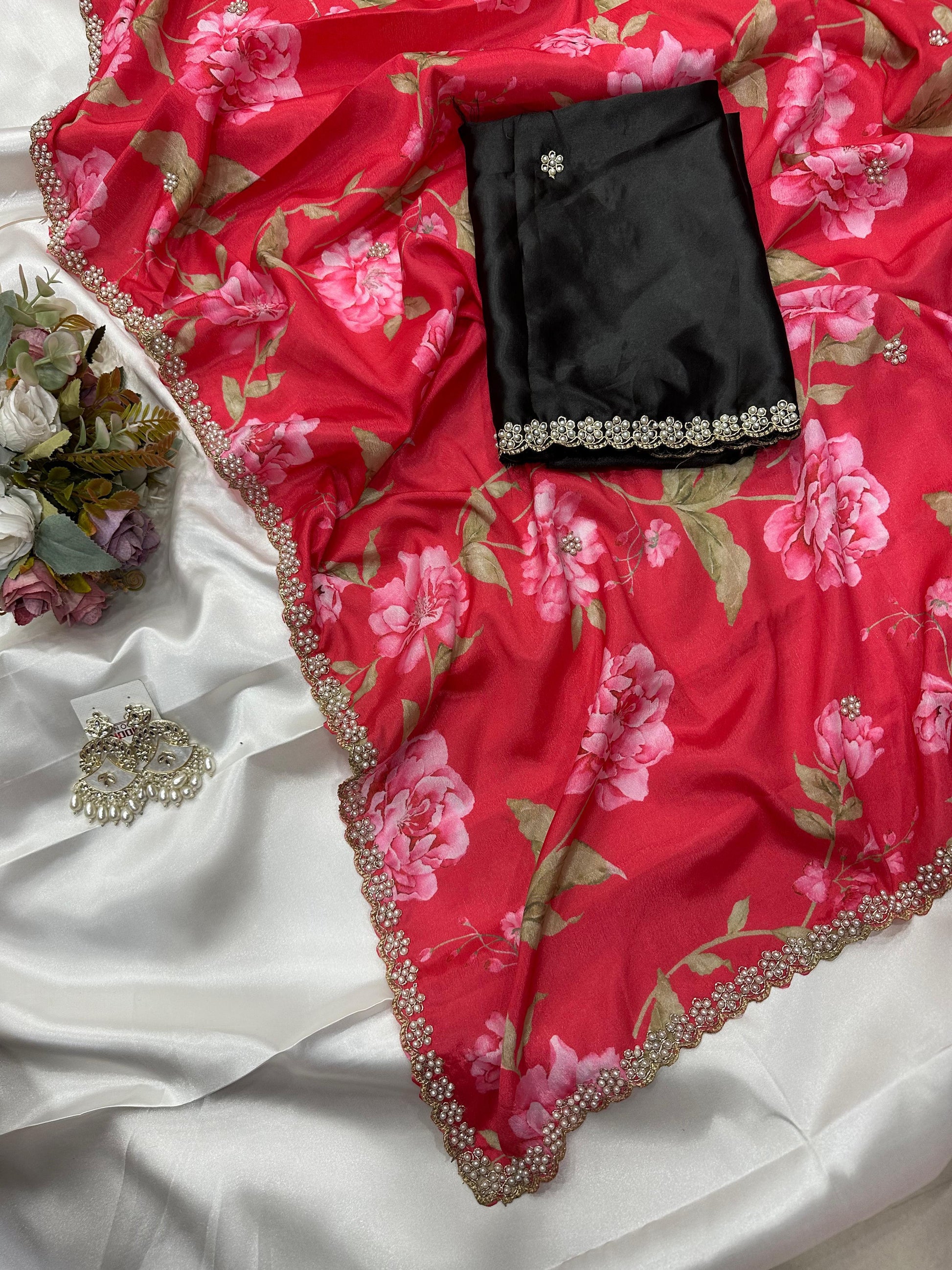 Red floral embroidered chinon saree with black blouse piece. 