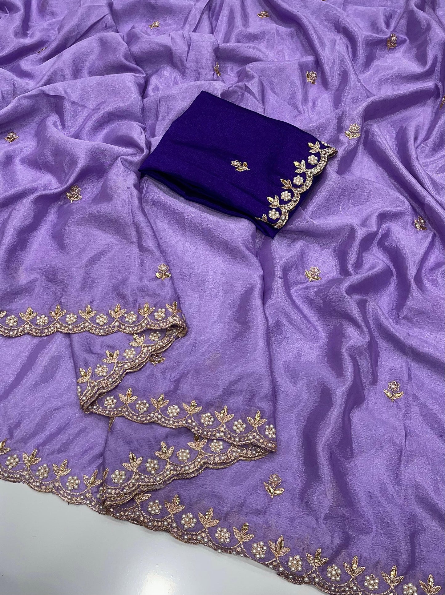 Lilac chinon saree with gold embroidery and purple blouse piece 