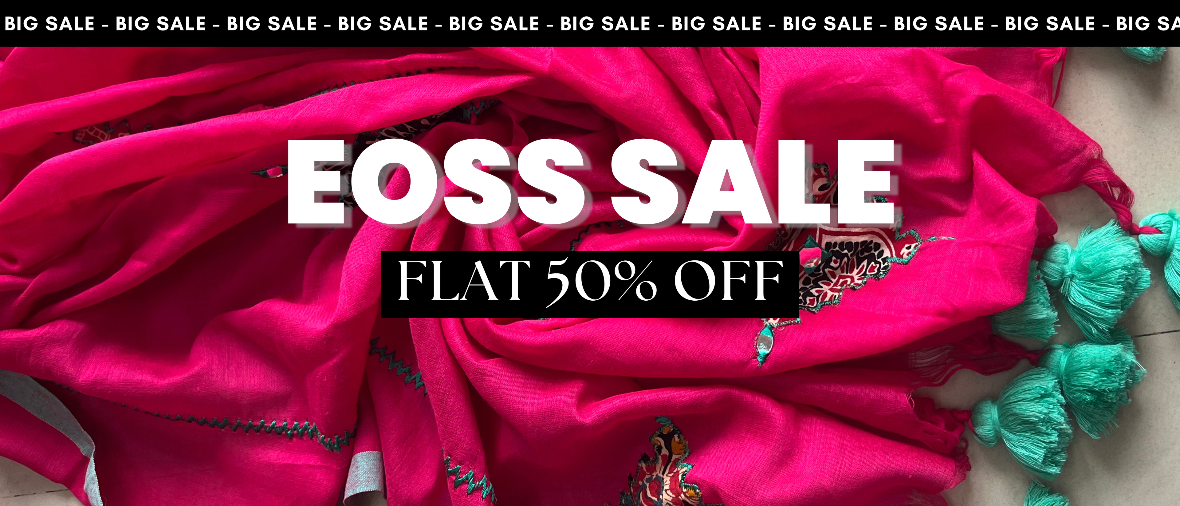 Pink soft cotton saree with green accents and 'EOSS Sale' text on a black background